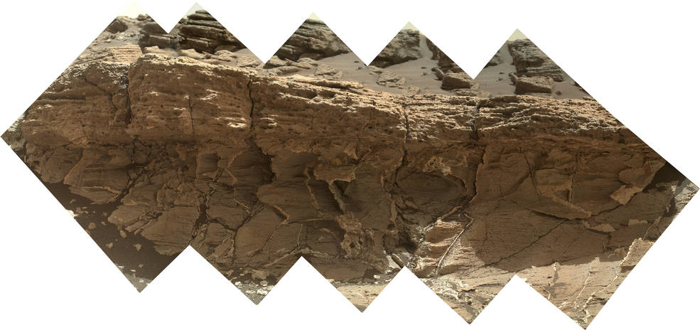 A rock outcrop dubbed "Missoula," near Marias Pass on Mars, is seen in this image mosaic taken by the Mars Hand Lens Imager on NASA's Curiosity rover. Pale mudstone (bottom of outcrop) meets coarser sandstone (top) in this geological contact zone, which has piqued the interest of Mars scientists. Credits: NASA/JPL-Caltech/MSSS